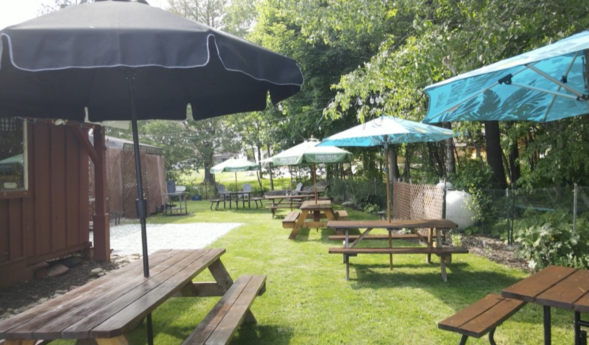 Back lawn outdoor seating at The Loft Tavern